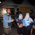 Gandeng IMAKEN, KKN UIN Walisongo Adakan Operasi Masker