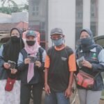 Sosialisasikan Protokol Kesehatan, KKN UIN Walisongo Lakukan Pembagian Masker