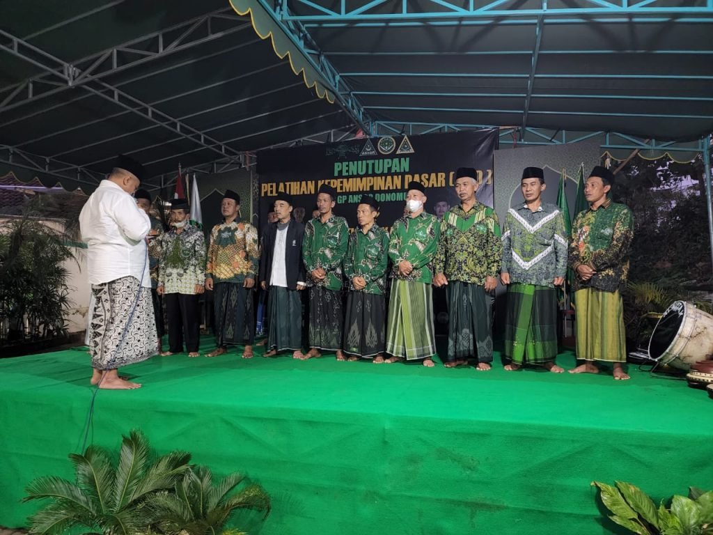 Potret Pelantikan Bersama MWC NU dan Penutupan PKD PAC GP Ansor Donomulyo Prosesi pelantikan MWC NU Donomulyo oleh KH Hamim Kholili, Ketua PCNU Kabupaten Malang